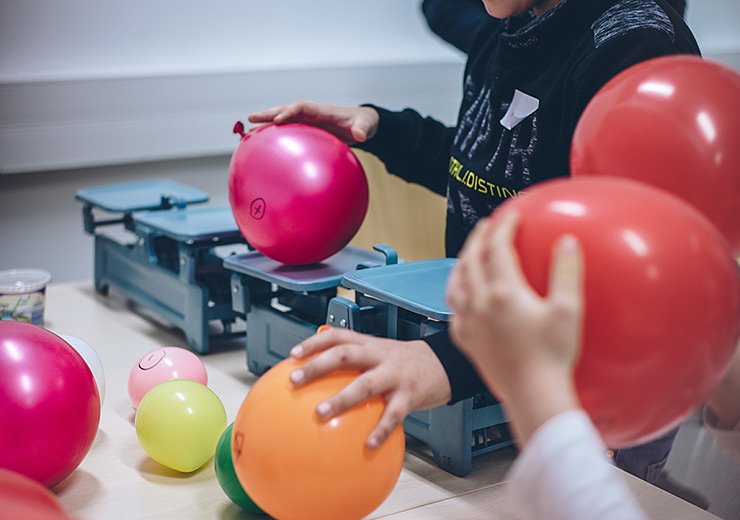Children exploring algorithmic thinking in our Abenteuer Informatik workshops.