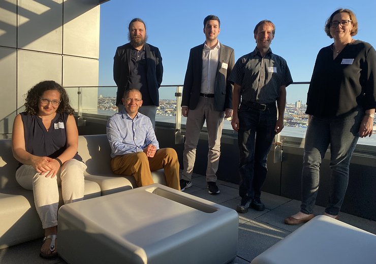 Distinguished Young Alumn David Penz (second from the left, standing) with jury members Magdalena Ortiz, Florian Michahelles, Stefan Woltran, Andreas Rauber and Margrit Gelautz.