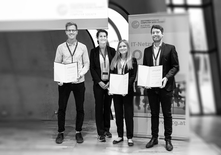 Martin Plattner, Gabriele Kotsis, Theresa Neubauer and Fabio Oberweger at the award ceremony (fltr).