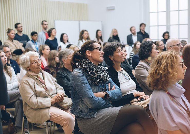 The audience (with Vice Rector Jasmin Gründling-Riener) listening carefully to Tobias Kohn's keynote — Picture: Amélie Chapalain / TU Wien Informatics