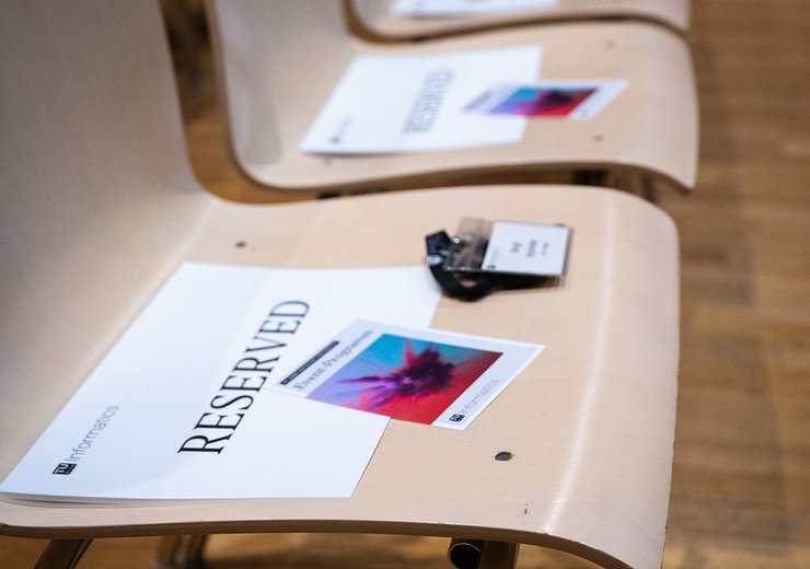 Event program and seats reserved for our panelists — Picture: Markus Hollo / TU Wien Informatics