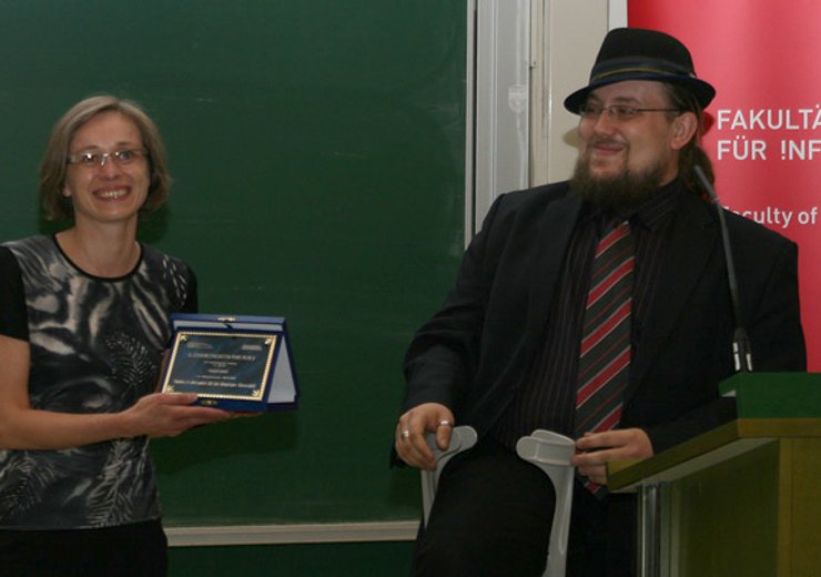 M. Oswald erhält den Lehrenden-Award in der Kategorie "Bester Vortrag".