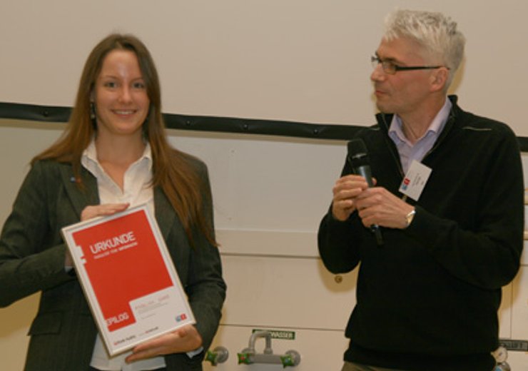 A. Garz und Jury-Vorsitz U. Egly bei der Verleihung des "Poster-Award sponsored by Bank Austria".
