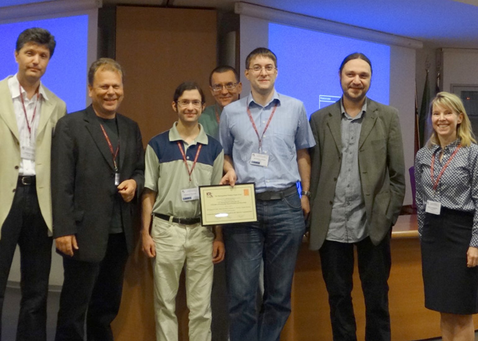 Übergabe des “Distinguished Student Paper Prize”: T. Eiter (TU Wien), G. Brewka (Universität Leipzig), J.P. Wallner (TU Wien), M. Truszczynski (University of Kentucky), W. Dvořák (TU Wien), S. Woltran (TU Wien), S. McIlraith (University of Toronto) (v.l.n
