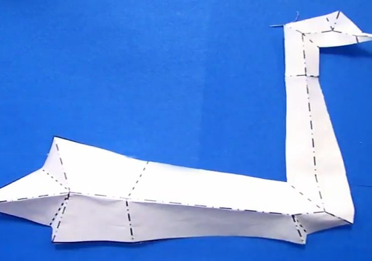 With a specific folding technique and a single cut, Erik Demaine transforms a rectangular paper into a swan. — Picture: Erik Demaine