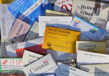 Helmut stopped counting his many name tags a long time ago.