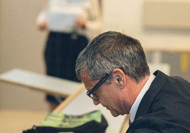 Rector Jens Schneider listening carefully to the lectures, taking notes — Picture: Amélie Chapalain / TU Wien Informatics